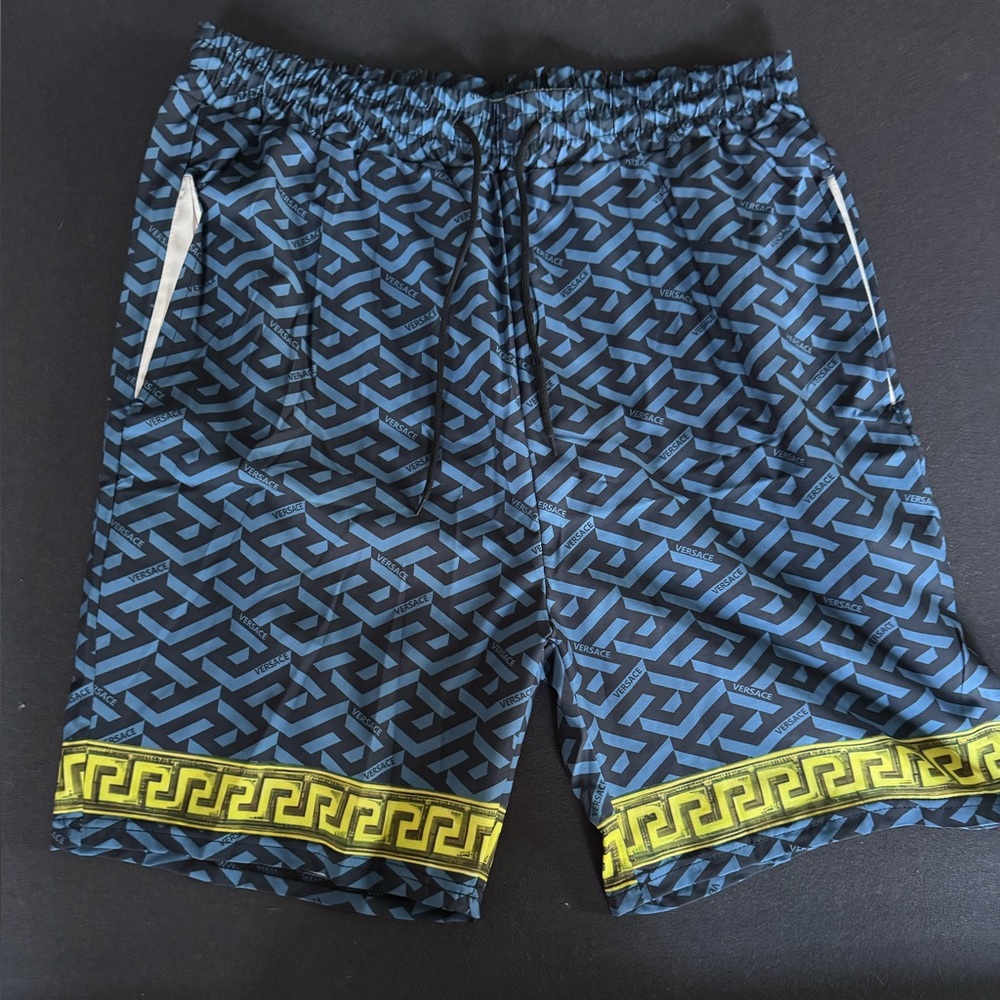 Geometric Logo Print Athletic Shorts with Yellow Accent